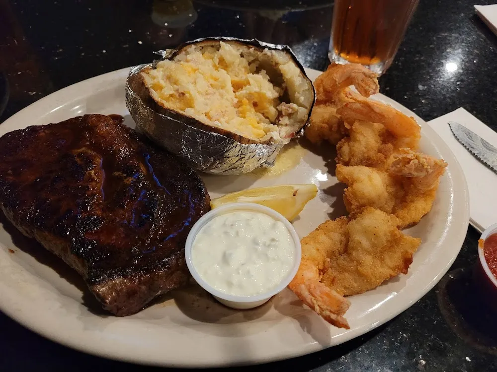 Steak Diane with Fried Shrimp and Loaded Baked Potato